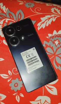 Redmi Note 13 Pro in Fresh condition with Original Charger and Box.