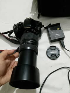 Canon 550d body battery charger beg Tamron 70-300mm lens manual h