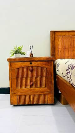 wooden bed including side tables and 8 inch spring mattress