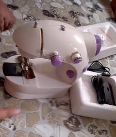 Portable mini sewing machine