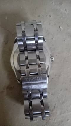 Tissot couturier watch model T035410