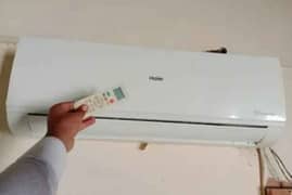 Haire AC DC inverter 1.5 ton good condition 10by10 hai