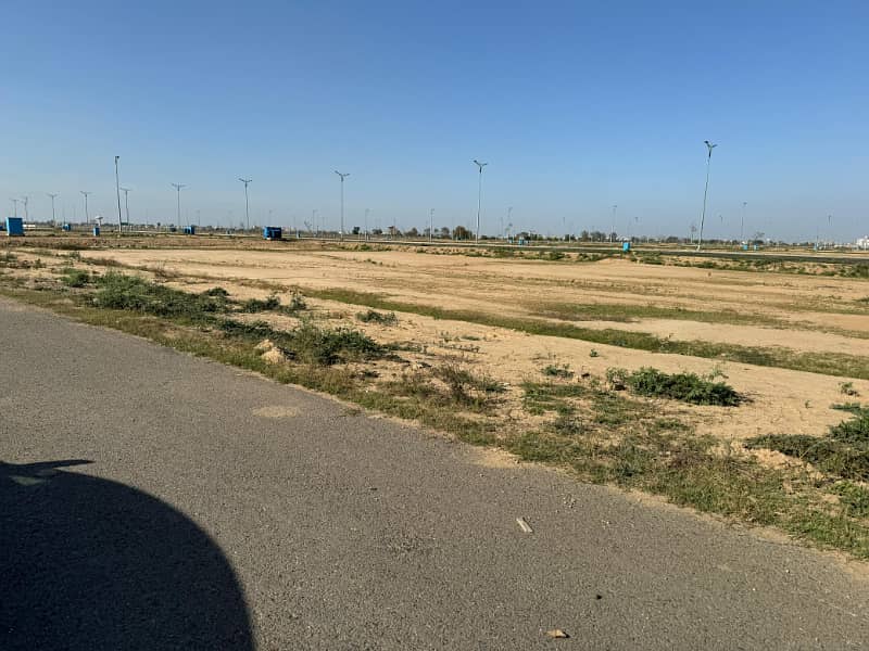 1 Kanal Plot For Sale Near The Golf Course, Behind The Main Road, Plot No. 265, Block D, In DHA Phase 9 Prism. 1