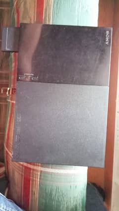 Original Play station 2 with 8 games and with original box