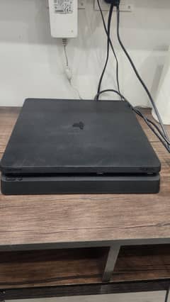 Playstation 4/Ps4 slim with 7 hit games and 2 controllers