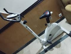 Exercise cycling machine