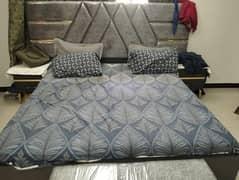 hi gloss bed with side tables and puffy for sale (3 months used)