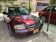 Suzuki Baleno 2003 burgundy manual transmission