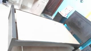 pair of single bed with side table