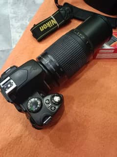 nikon D40 with 70 - 300 mm lens
