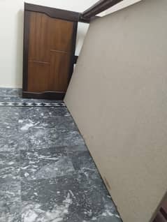 wooden single bed with mattress