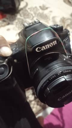 Dslr Canon 60D with 50 mm lense and external Flash
