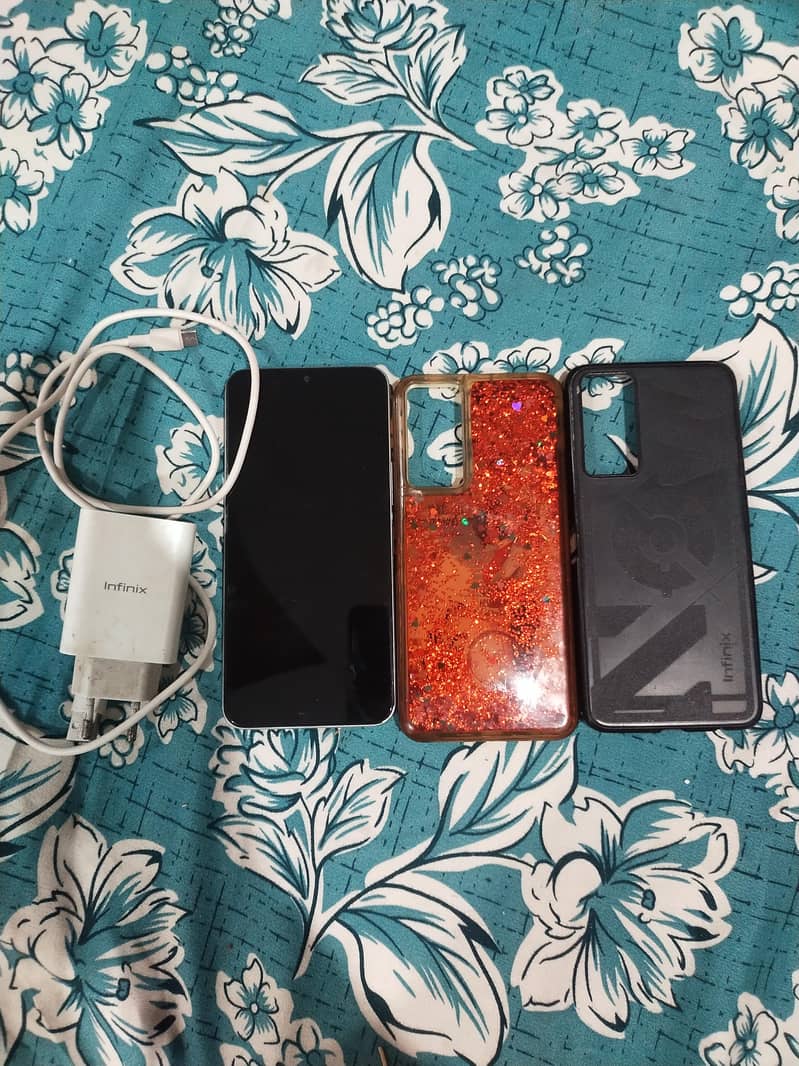 infinix note 11 with complete box with 2 pouches in gud condition 0