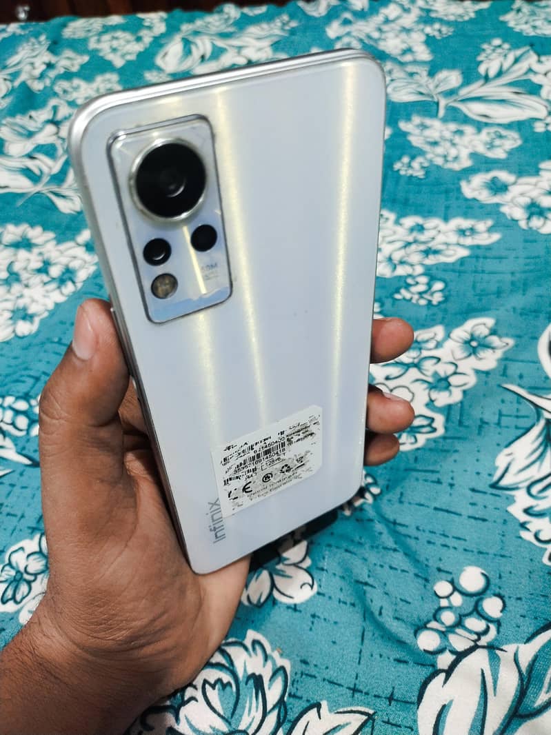 infinix note 11 with complete box with 2 pouches in gud condition 5