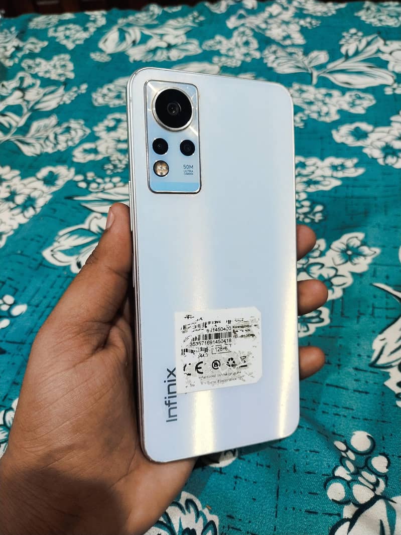 infinix note 11 with complete box with 2 pouches in gud condition 4