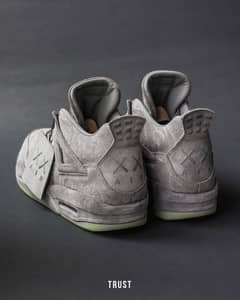 Jordan 4 kaws grey  Glow