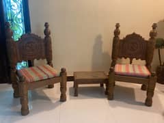 2 chairs with small table