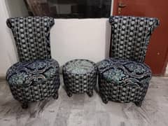 Two chairs with table
