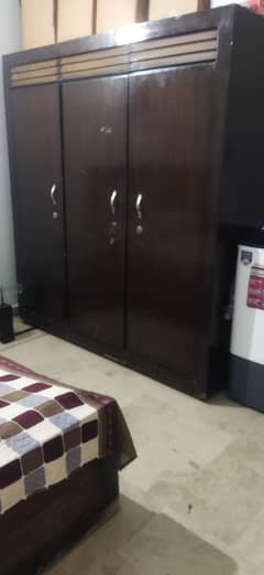 wooden bed , cupboard, Table