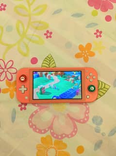 Nintendo Switch Lite with one Mario game