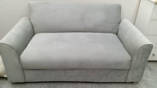 2 Seater Sofas ( 2 pieces) with one free centre table .