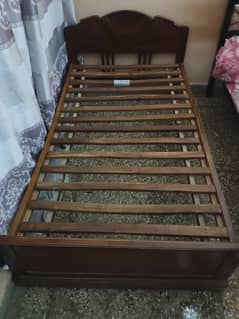 wooden single bed