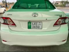 Toyota Corolla Xli convert GLI  2013 New tyre led back camera