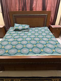 Queen size bed with side tables