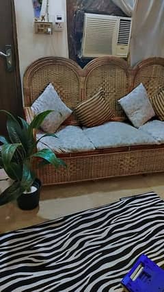 cane sofa