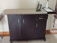 Iron table with storage cabinets