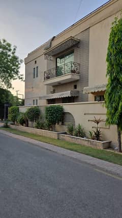 Corner, facing park,half basement,back of main road. Used but well maintained