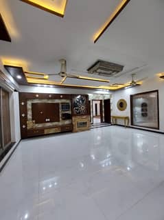 1 Kanal Full hous available for rent new type wat solar installed 18kv Pcsir ph2 society B