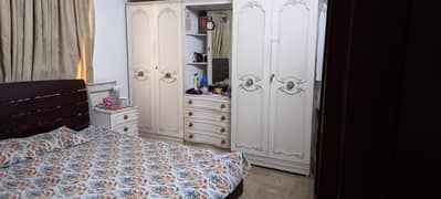 bed set with English wardrobe