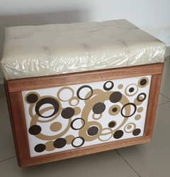 Cushioned wheeled wooden stool with storage
