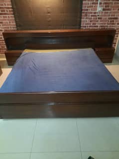 Double bed with attached side table