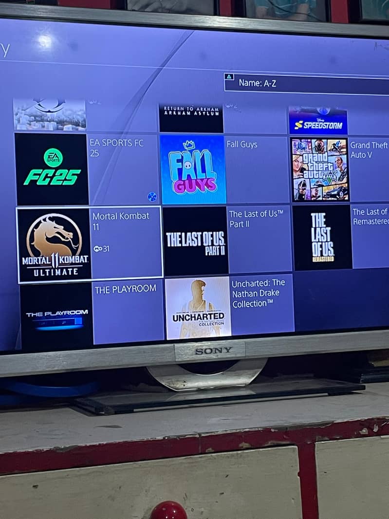 Ps4 pro 1 tb  with controller and all famous title in account 6