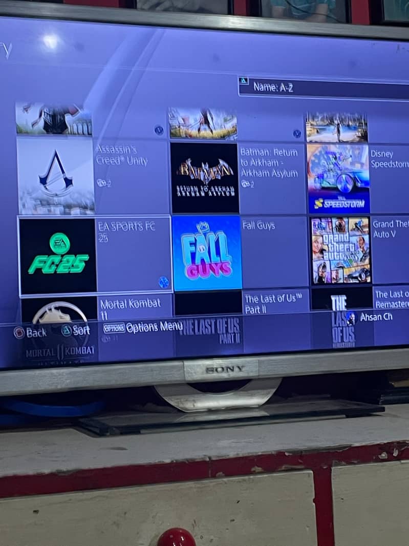 Ps4 pro 1 tb  with controller and all famous title in account 8