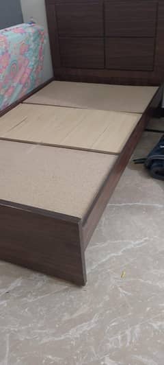 Single bed with mattress and ply