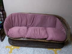 Two cane sofas