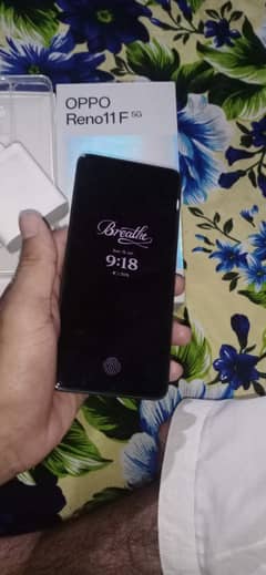 oppo Reno 11f 5g box and charge 1 hand use