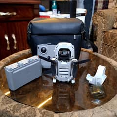 Dji mini 2 fly more combo (10/10++) Like new under 10 cycles