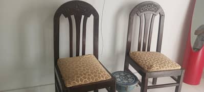 4 chairs one side table with round dining table