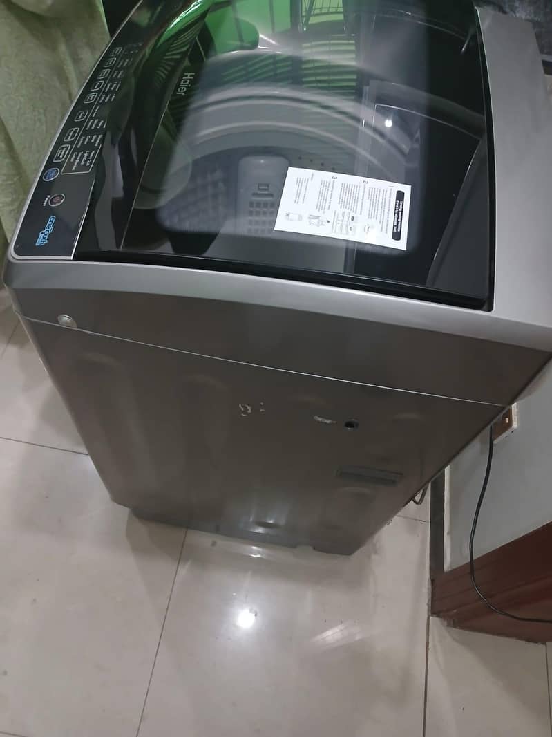 HAIER HWM 150-1708 is a 15 kg, top-loading, fully automatic 2