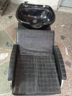 Hair wash basin with attached Chair