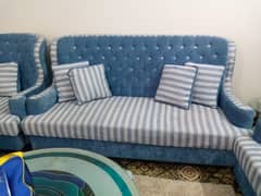 7 seater sofa with  table and stools