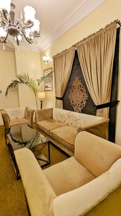 5 seater Sofa Set, Table, 4 Curtains, and 2 chairs for sell.
