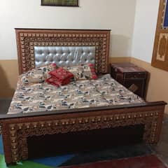 king size bed and dressing table