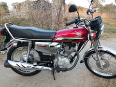 all okay bike red colour bike 2022 model Islamabad number