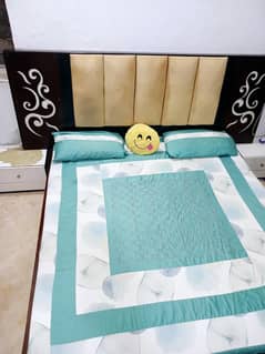 double bed with side tables