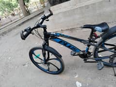 Plus cycle with star rims and 21 speed gears
